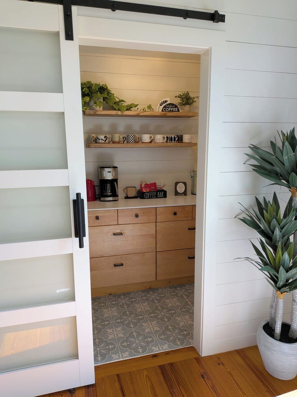 Tucked behind a sliding barn door, you’ll find our dedicated beverage nook. 