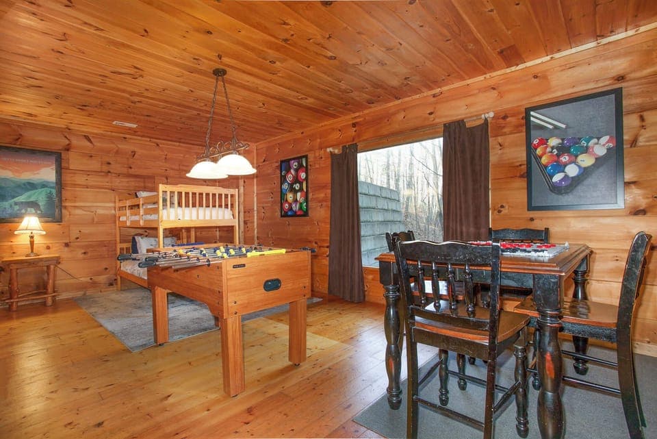 Game room with foosball, Pac-Man arcade, checkers, and smart TV