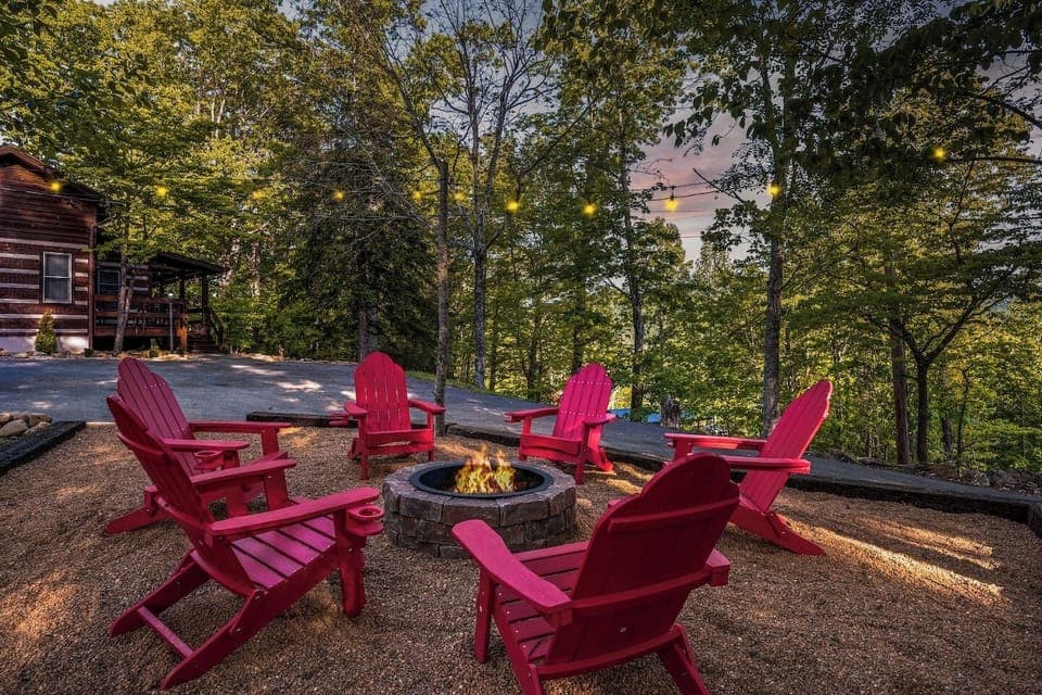 Gather around the glowing firepit under twinkling string lights as the sun sets through the trees. This is where memories are made—s`mores, stories, and starlit laughter.