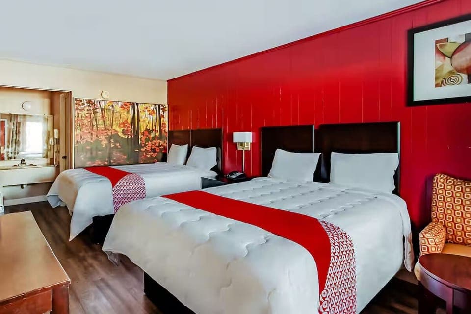 Stretch out in a spacious room with two comfy beds.