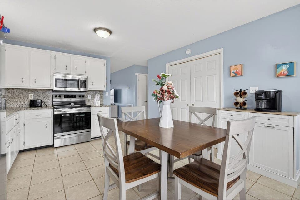 Fully equipped kitchen with coffee bar and laundry included. 
