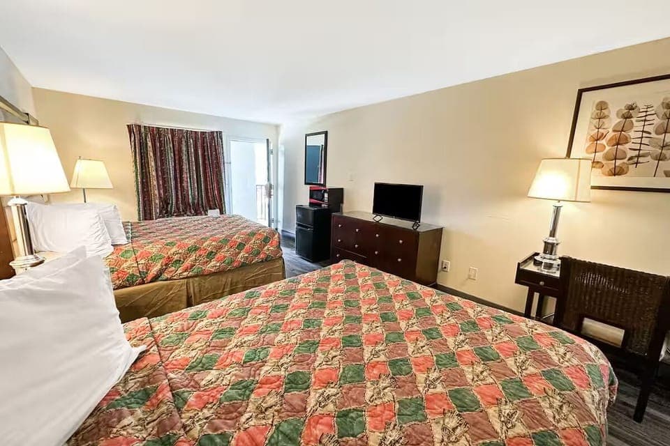 Stretch out with extra space, light, and two plush beds.