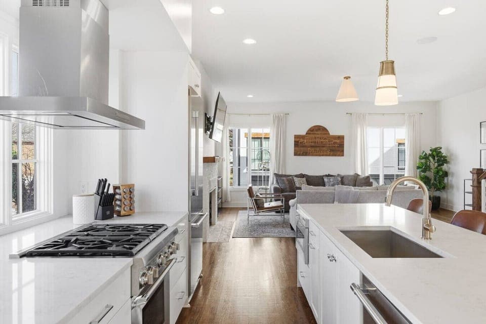 Fully equipped kitchen with stainless steel appliances, seating for 4 at the kitchen island, additional seating at the dining room table and all the dishware / utensils you might need.
