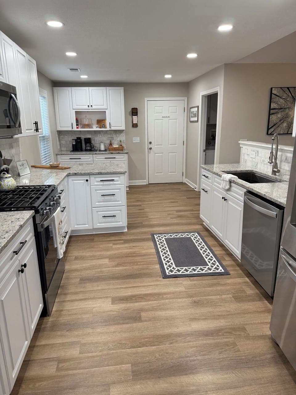 The bright well equipped kitchen has everything you need.