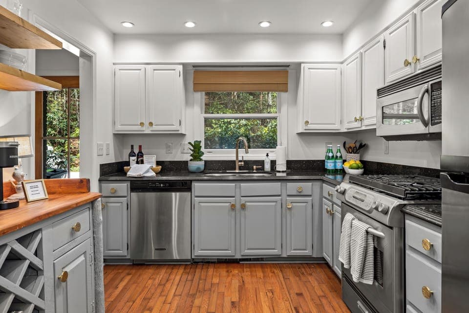 A fully stocked kitchen with appliances is ready for you.
