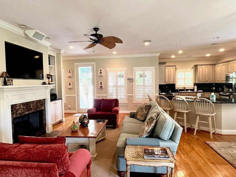Spacious living room and kitchen area perfect for family gatherings.