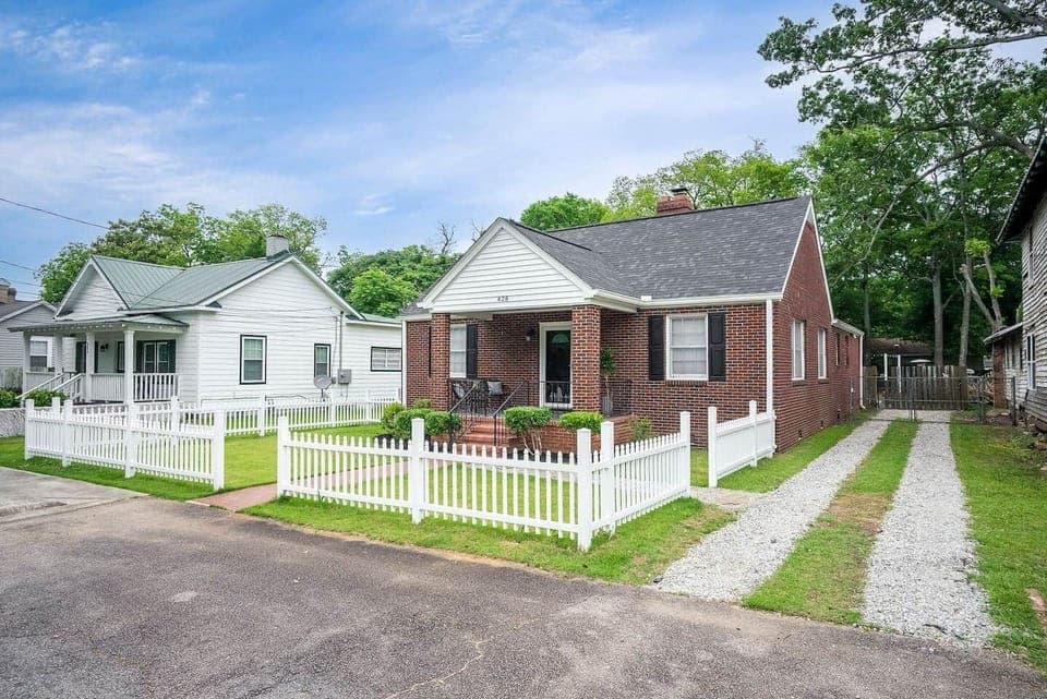 You can park four cars in the driveway and two in the front parking area for a total of six. There is an extra gate that locks at the end of the driveway, it holds one car. Additional parking can be arranged if needed. 
