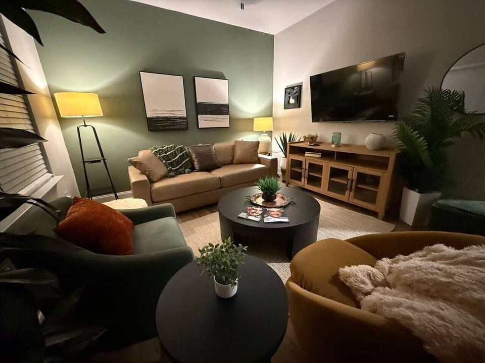 You’ll enjoy a cozy living area with plenty of seating and a 55” Smart TV, perfect for streaming your favorite apps after a day exploring Anderson.