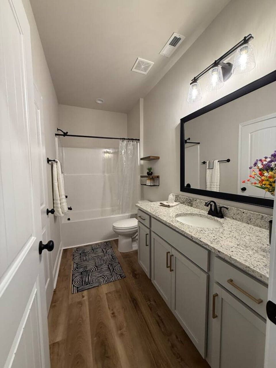 Private full bathrooms with strong water pressure, handheld shower hose, and fresh towels ensure a comfortable stay.