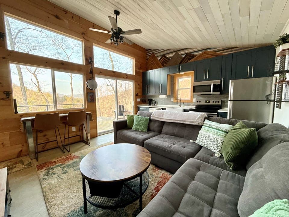 Board games, books, and mountain views set the tone for quiet, connected evenings at Wrigs Ridge.