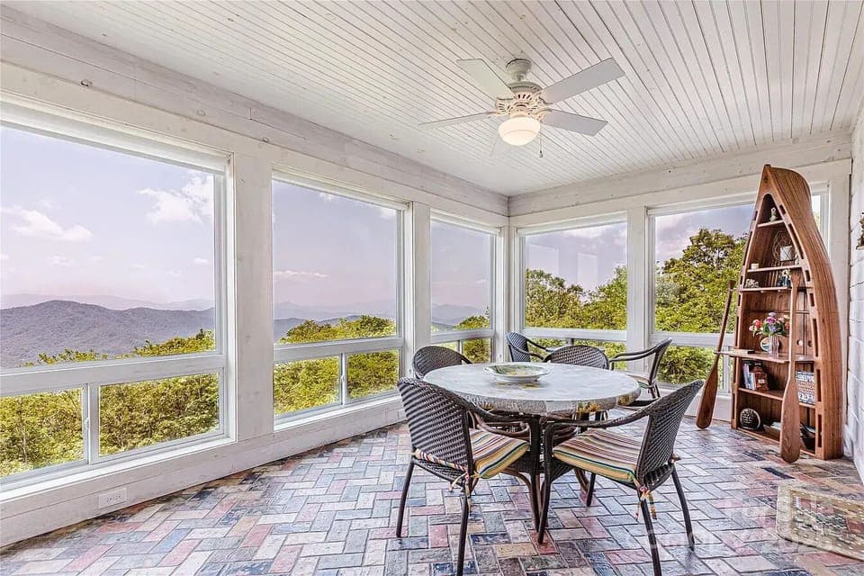 Sunlit Porch: Unwind with breathtaking mountain views in this stylish, inviting space!