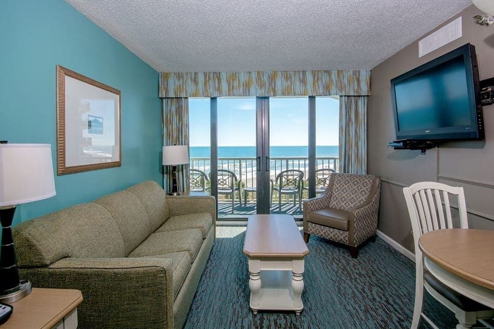 Stretch out on the sofa and watch waves roll in.