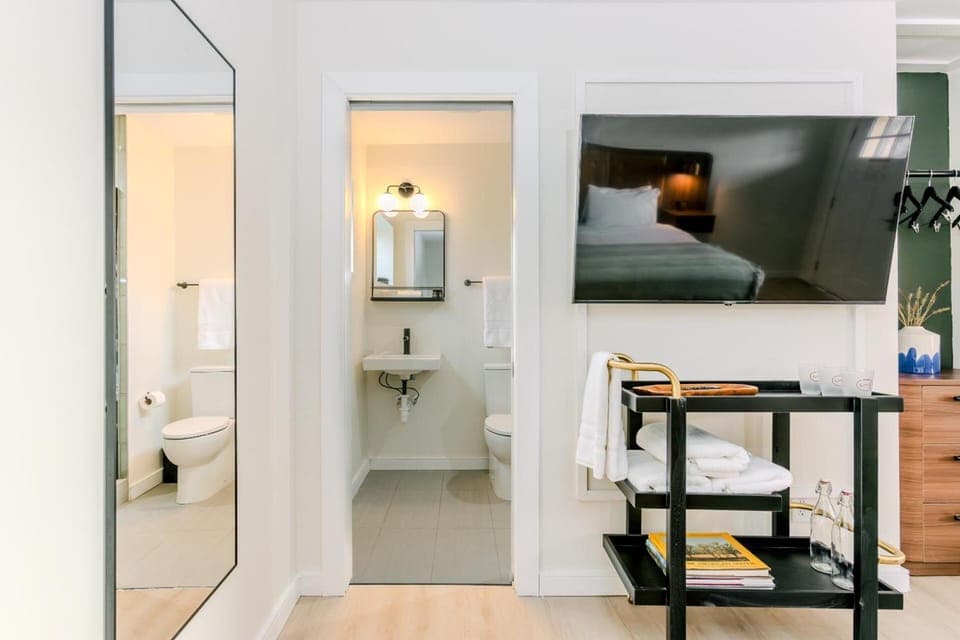 Freshen up easily with a convenient sink area and essentials.