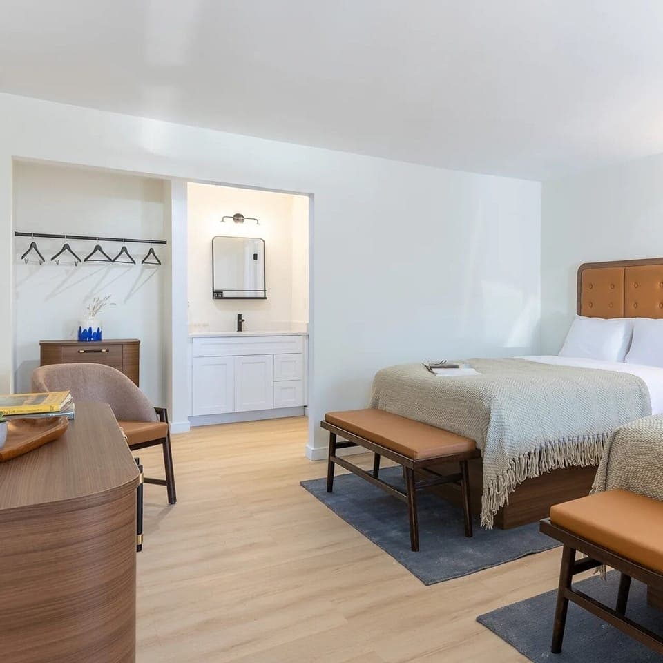 Spread out comfortably with open storage and a handy vanity nook.