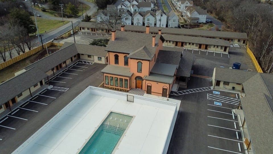 Unwind poolside with spacious grounds and easy parking.