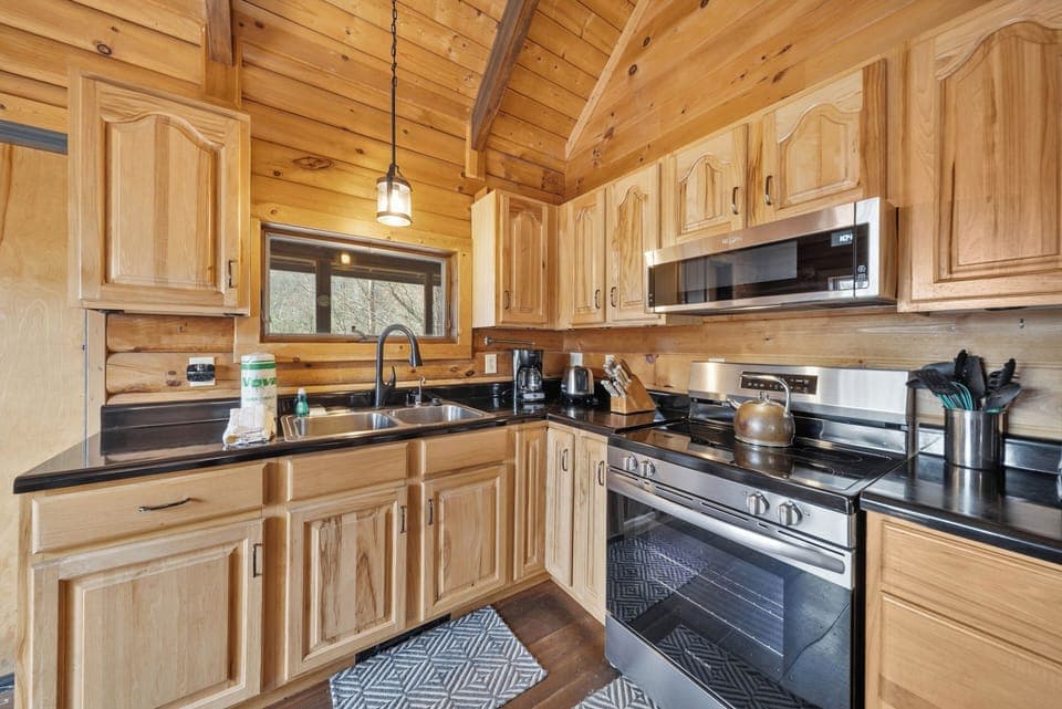 Well-Equipped Kitchen has Granite Counters and Stainless Appliances