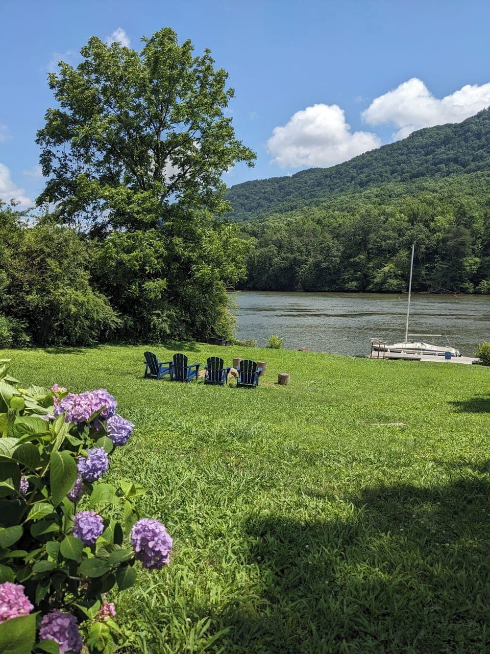Our massive riverfront yard welcomes you!