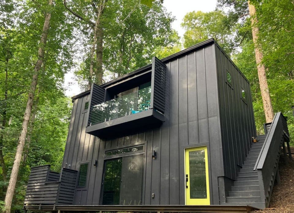 Welcome to our eclectic tiny home studio apartment admist the trees! Our home feature private backdoor entry to the lower unit. Each unit is completely separated by floors and separate entry doors.