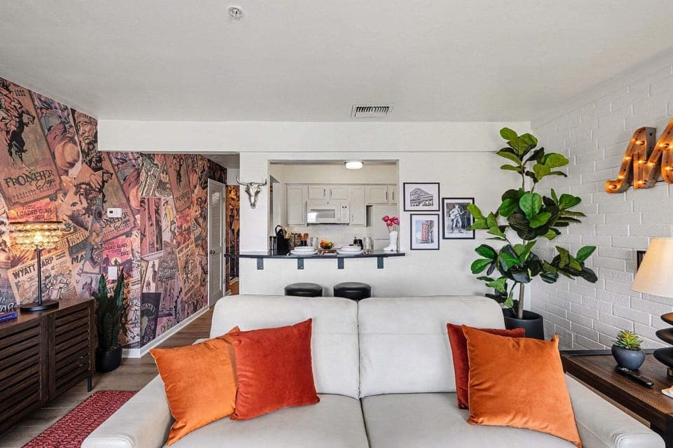 Open living area with Cozy furnishings, a smart TV, and access to the private patio overlooking the Cumberland River.