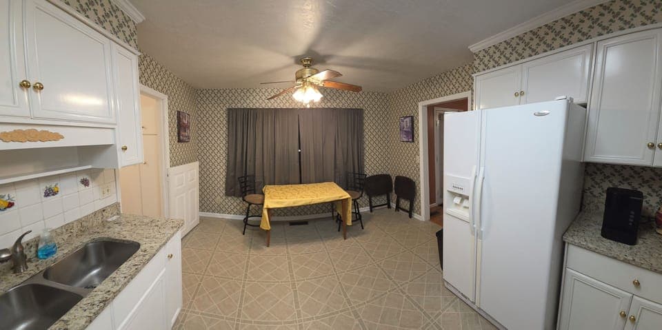 Kitchen with Eat in Table and Chairs, granite counters,  double sink