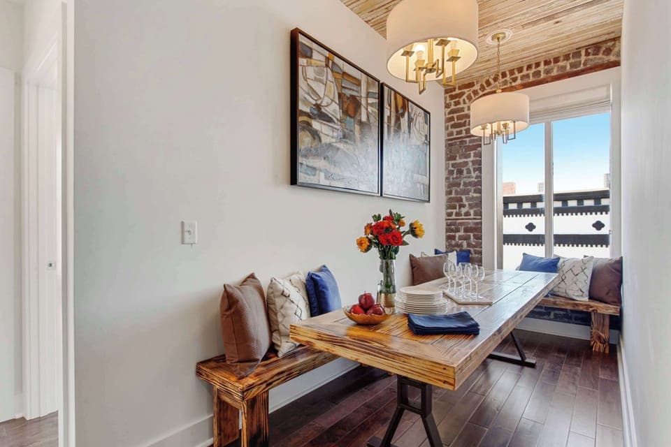 Unit 303 | Open Concept Dining Area | Indoor Dining Table | Group Seating | Third Floor