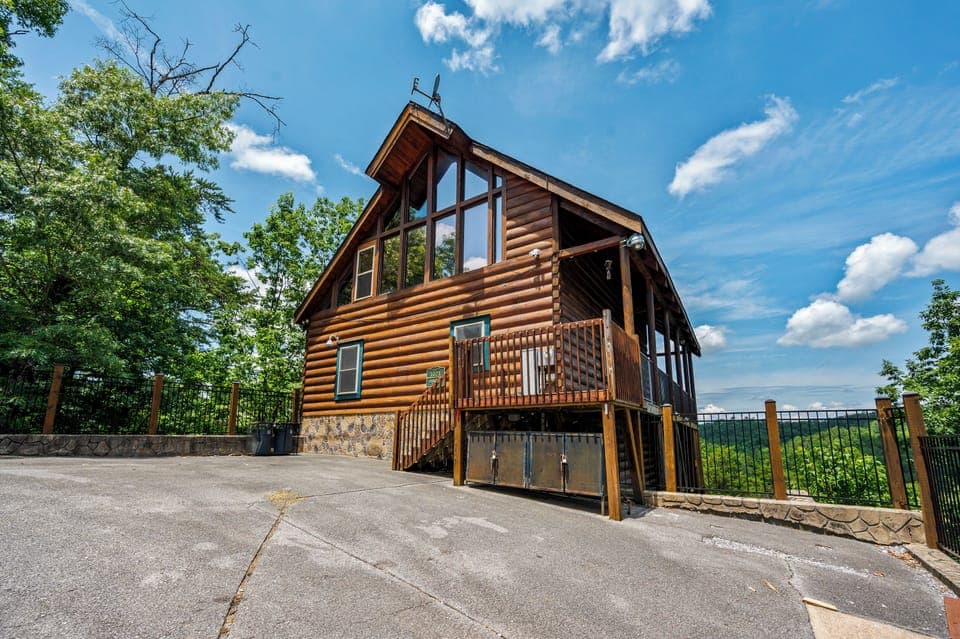 Lazy Bear's exterior view, our spacious three-level log cabin