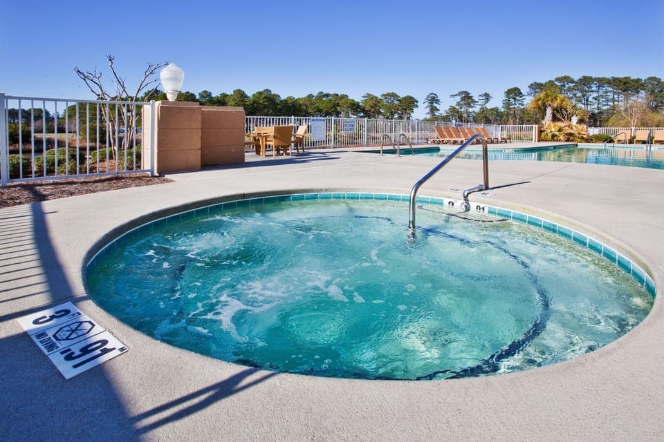 Unwind in bubbling hot tub after a day of exploring