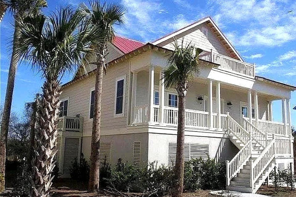 Relax on the front porch with rocking chairs and coastal breezes.