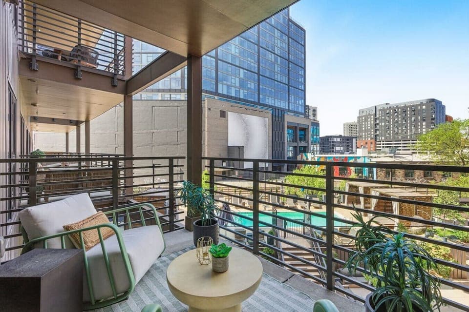 Private balcony with city views and outdoor seating. Perfect spot for you to enjoy your morning coffee and plan your Nashville adventures.