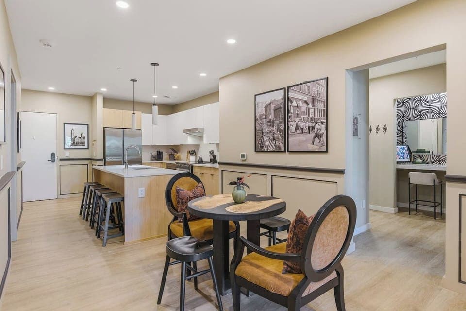 Seating for 4 in the dining area, plus additional seating available at the kitchen island.