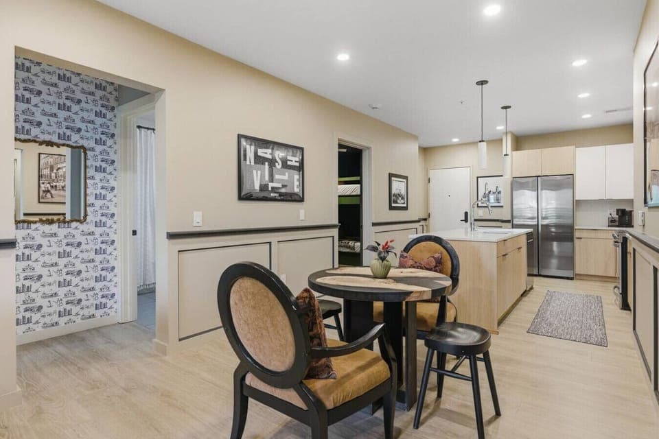 Seating for 4 in the dining area, plus additional seating available at the kitchen island.