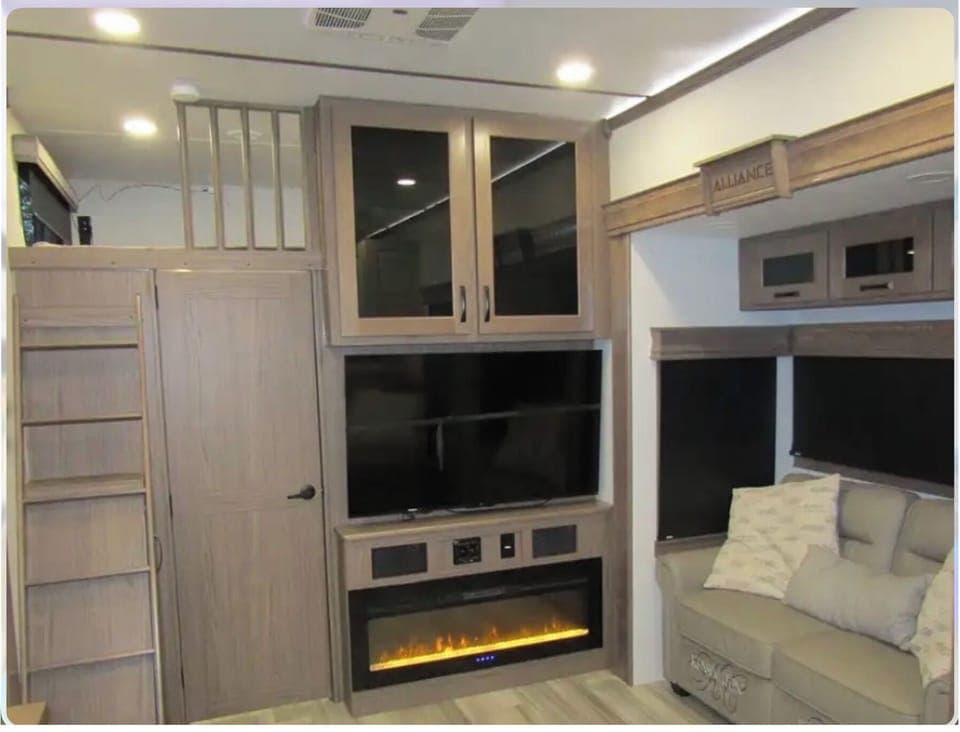 Picture to show working fireplace + blackout shades for privacy; door to bed2