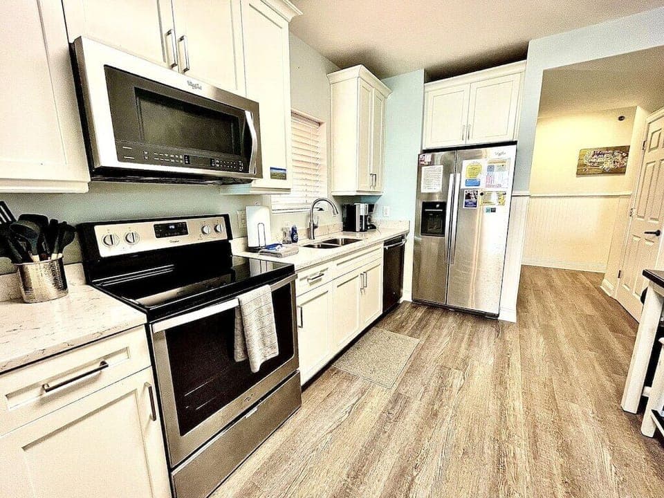 Kitchen with stainless steel appliances Oceanview, 102 Isle of Palms, SC | IOP Escapes