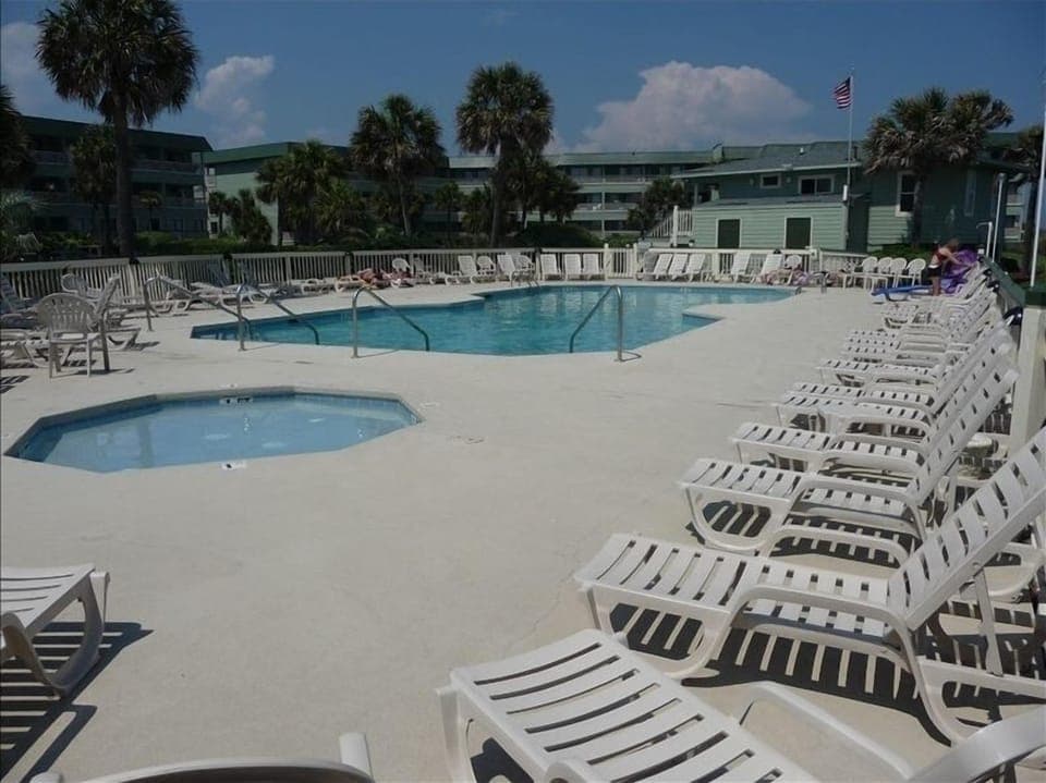Oceanfront pool area with childrens pool and sunbathing deck