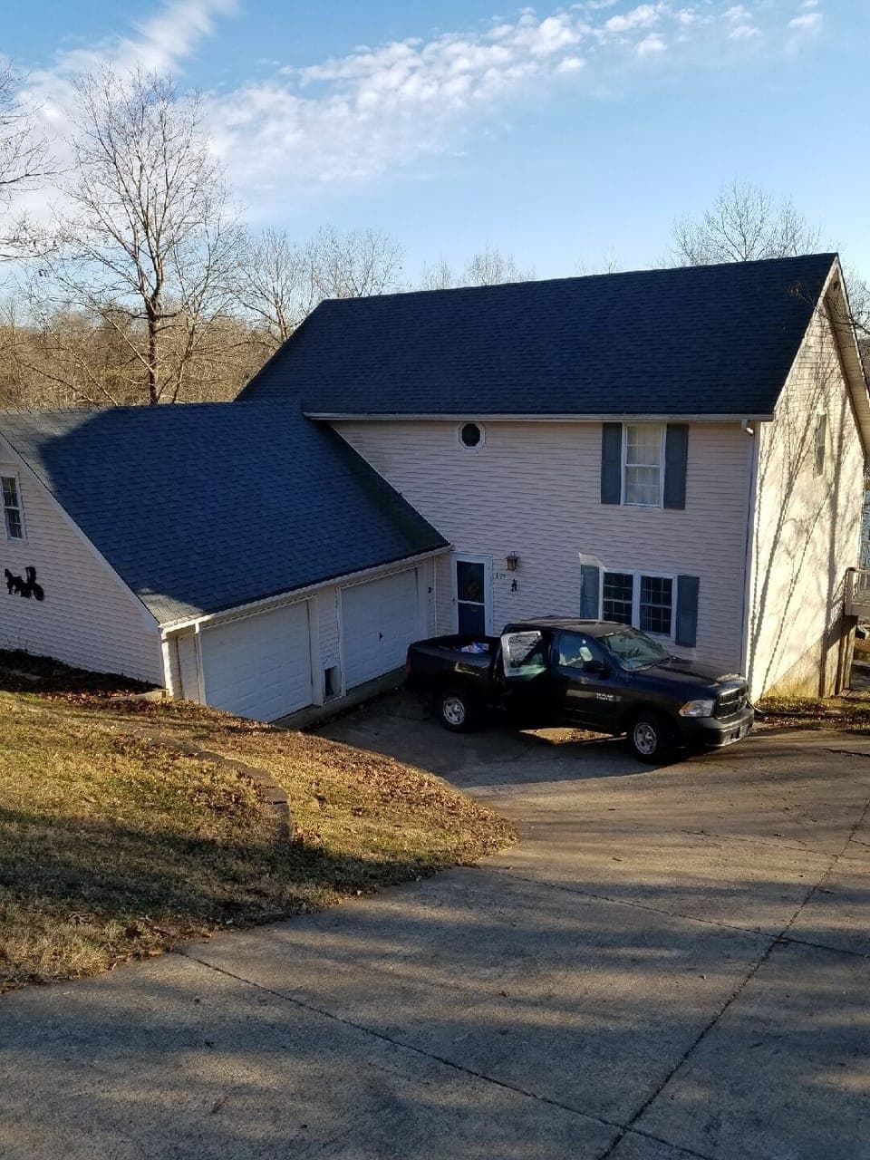 View of front of house from road.(steep driveway)