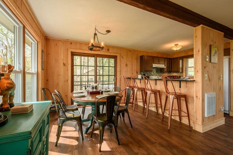 Bar Seating adds Four Dining Spots between Kitchen and Dining Area