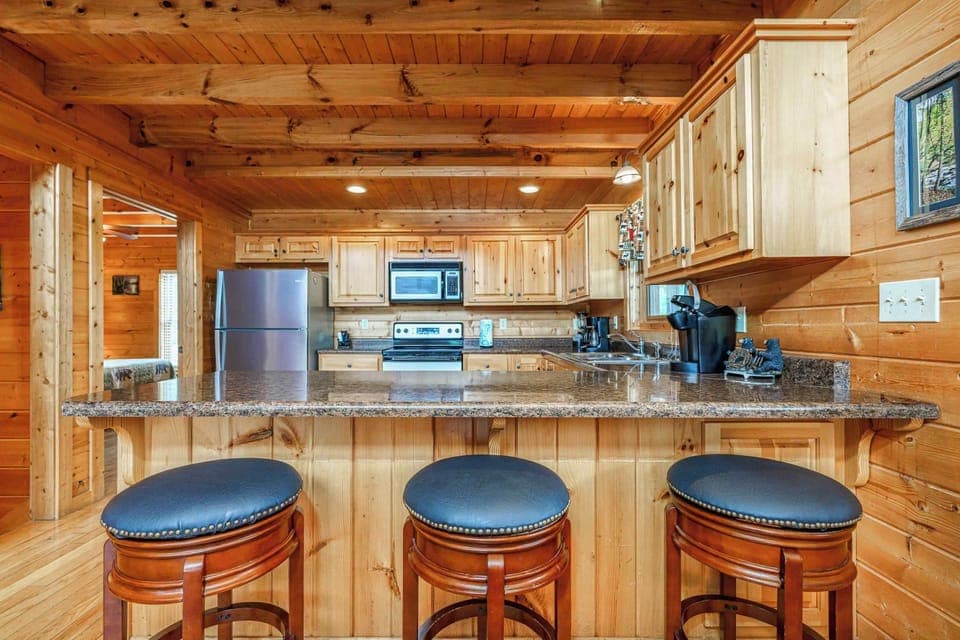 Three Bar Stools with Counter for additional Area to Eat
