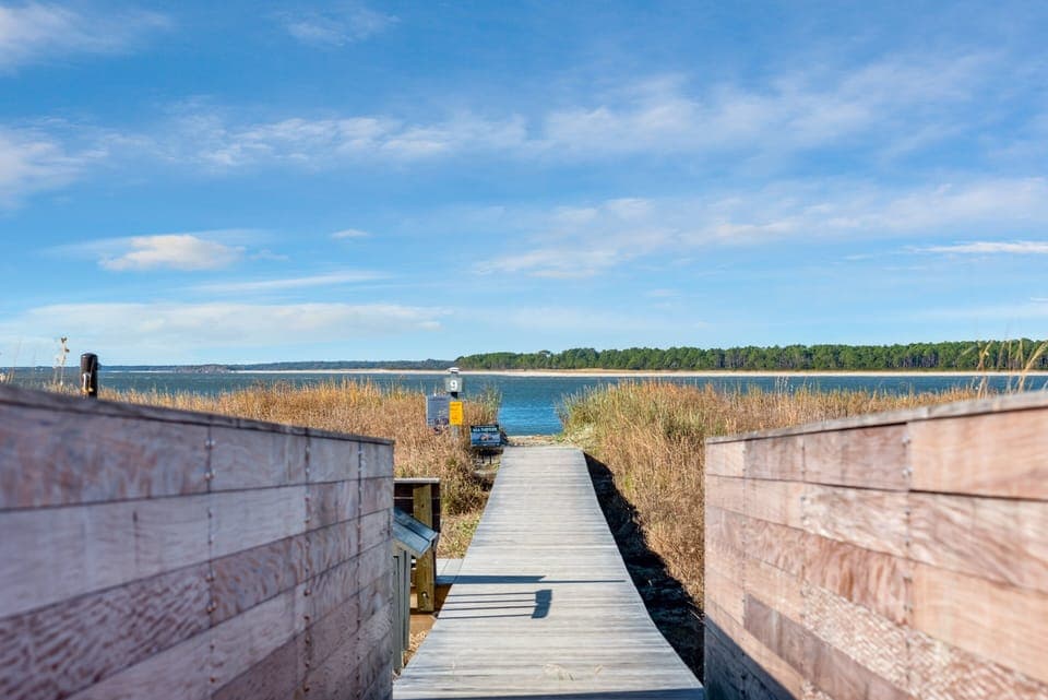 Boardwalk 9 opens to the area where the river meets the ocean.