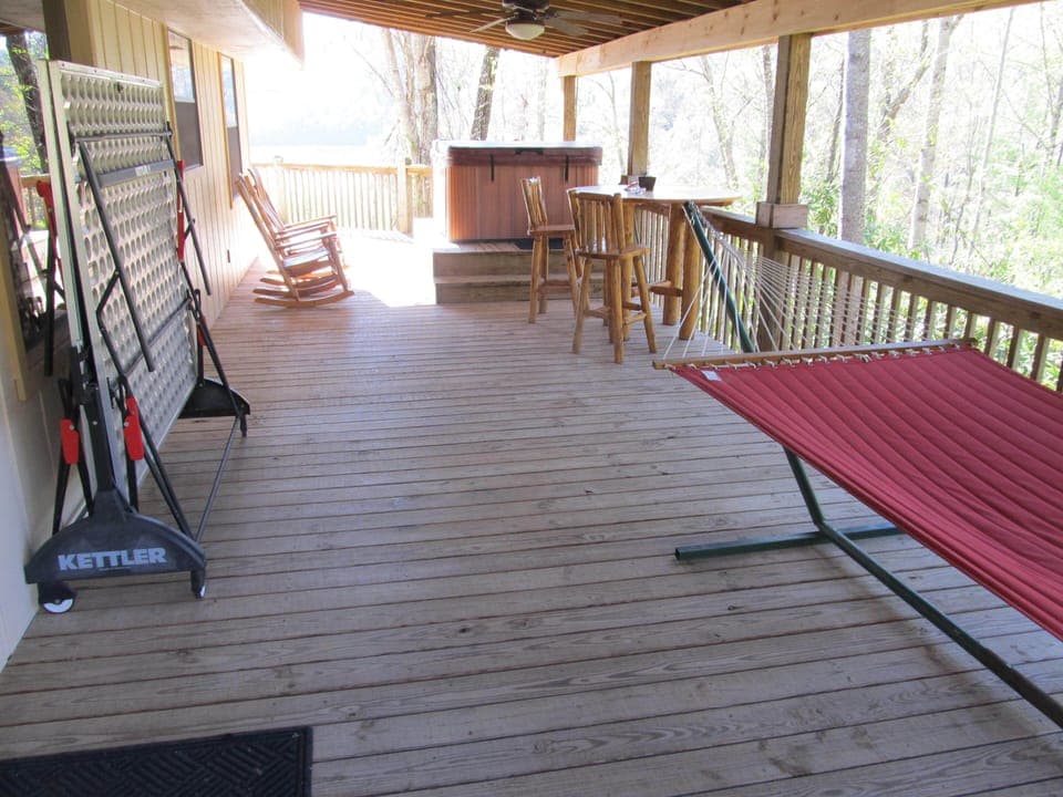 covered deck for hot tub, hammock, ping pong fun!