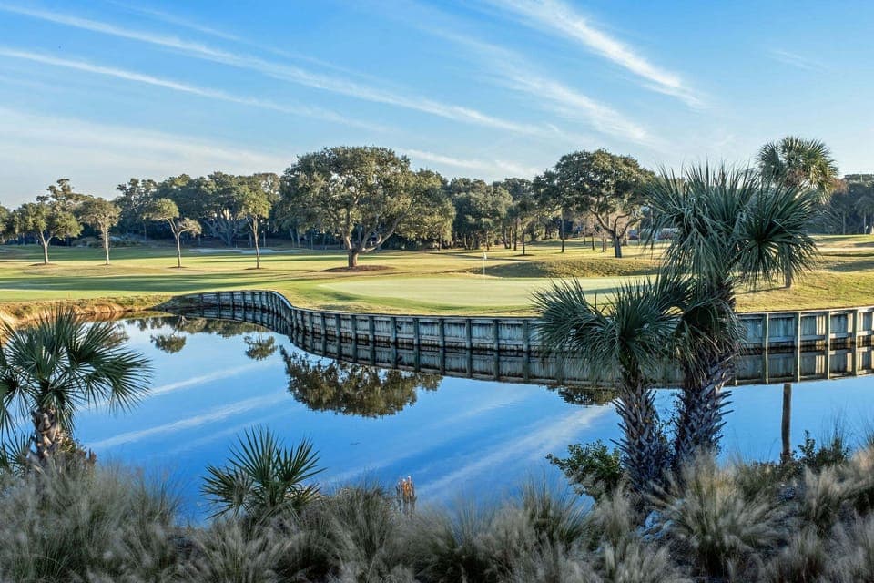 Watch the golfers on the 18th green along with wildlife in the lagoon from the upper or lower deck as well as the living area!
