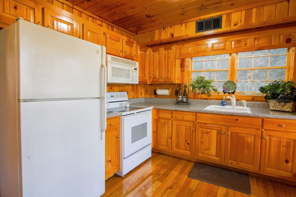 The kitchen is full size and has everything you need to cook full meals.