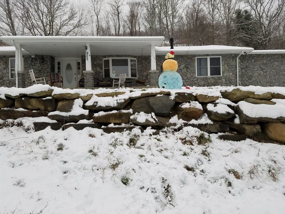 Front of the house with colored snowman
