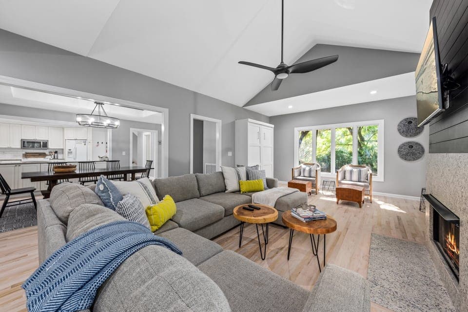 The living, dining and kitchen area open onto each other.