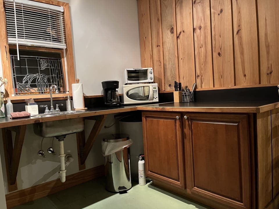 Kitchen includes Hot plate, Toaster, Microwave, & Coffee-maker