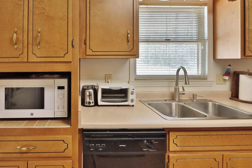 Kitchen  Microwave, Toaster Oven, Toaster,  Sink, Dishwasher, dishes & utensils