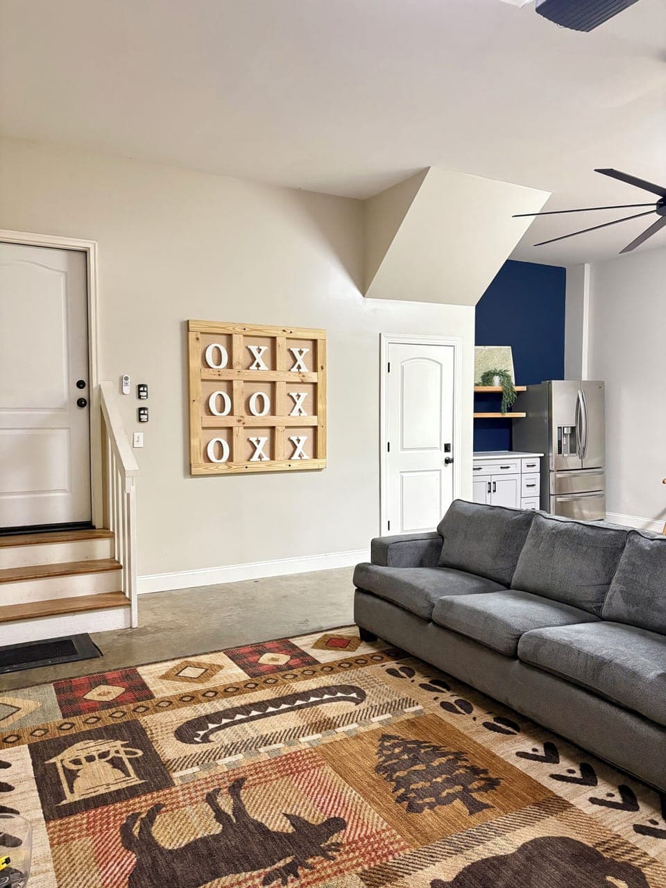 Garage room: Smart tv, recliner, window counter seating, 72” fan.