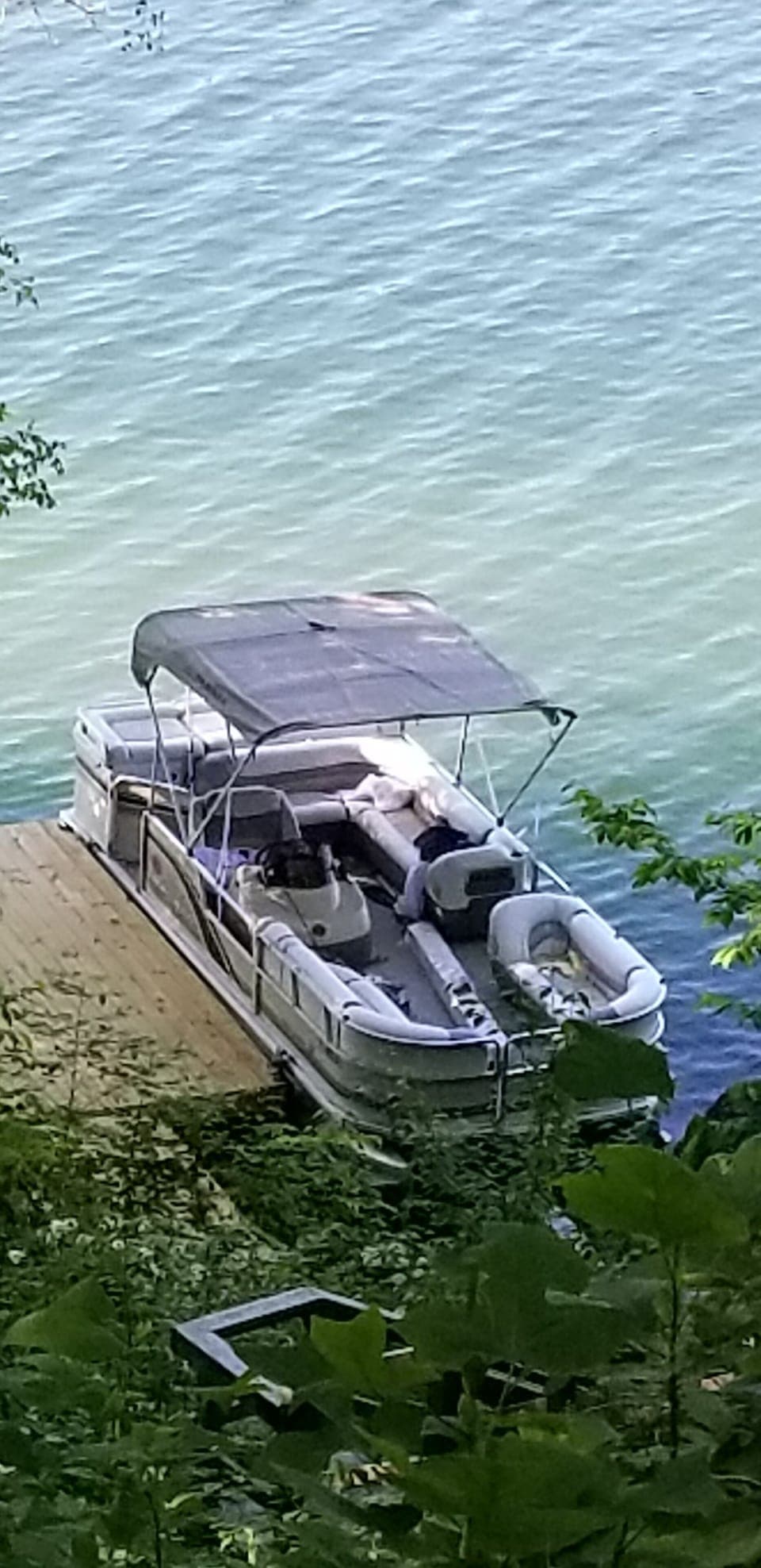 pontoon boat waiting for you to get out on the lake