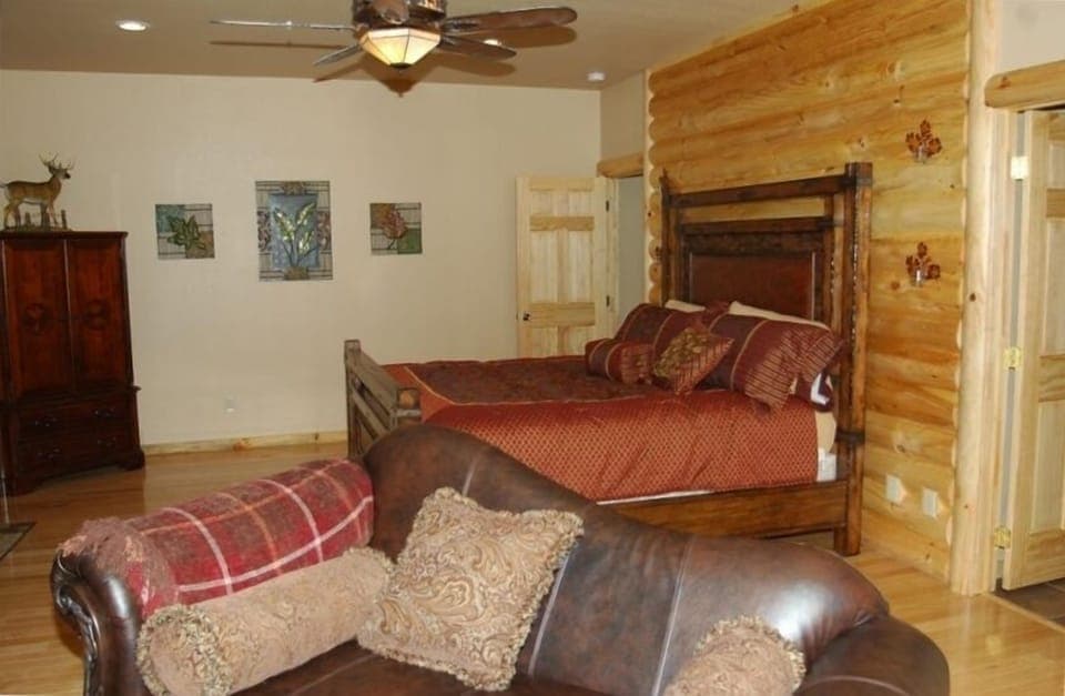 Master bedroom #2 with sofa and private fireplace