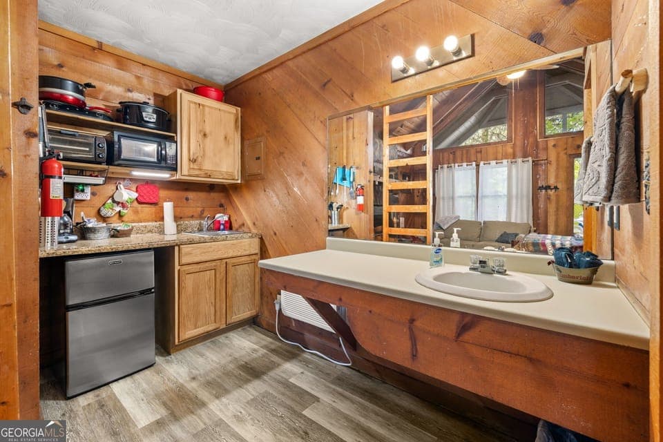 kitchenette and bathroom sink area