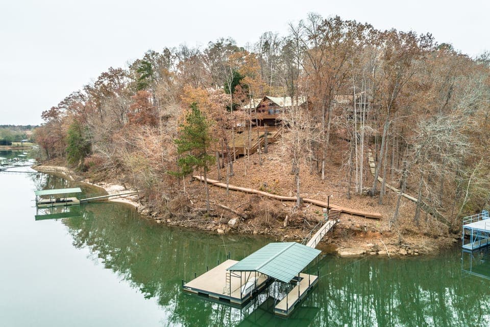 view of private dock and walkway from house